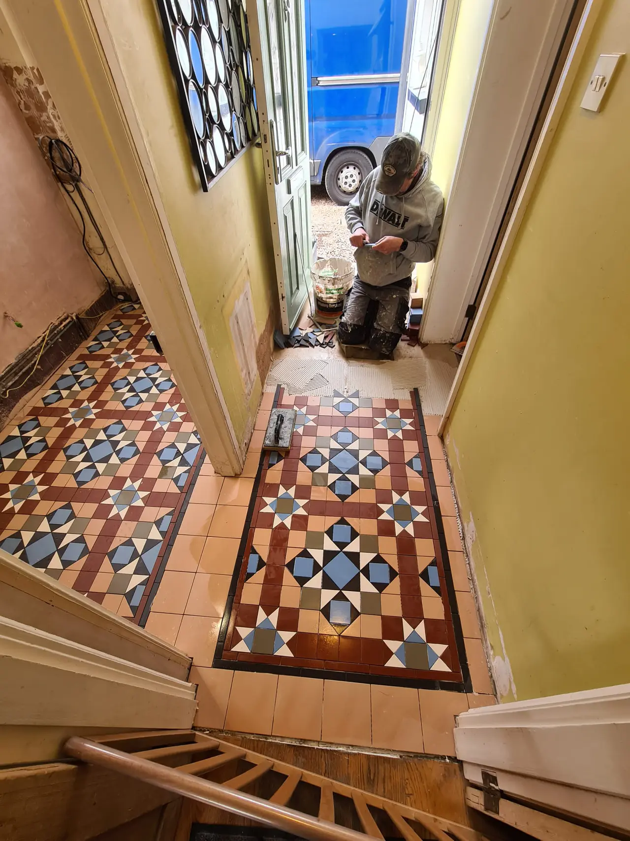 Victorian entrance hallway with a colourful encaustic tiled floor